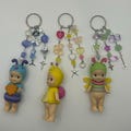 bug sonny angel keychains silver | beaded keychains | y2k, jumino core, trinkets, dragonfly snail accessory, collectible baby dolls