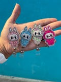 labub badge reels