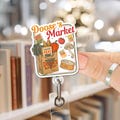 Doose's Market Stars Hollow Badge Reel, Autumn Festival ID Holder, Cozy Bookish Fall Retractable Name Tag, Librarian Book Festival Reel