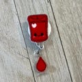 Happy IV bag badge reel, IV badge holder, blood bag feltie, badge pull, blood drop
