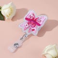 Pink Bow Badge Reel: Retractable ID Holder for Nurses, Teachers