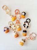 Halloween Phone chain bag charm with authentic POPMART pop beans: Skull Panda, Labubu, Pucky